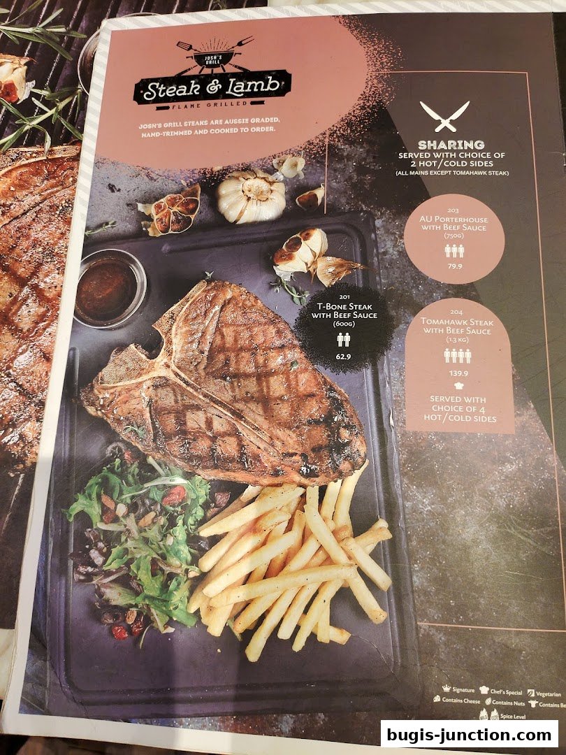 A menu from Josh's Grill featuring flame-grilled steaks and lamb, with a focus on T-Bone and Tomahawk steaks.