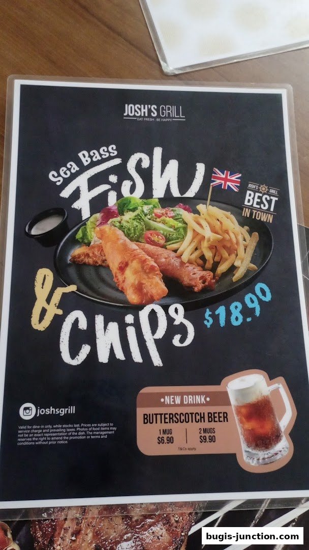 A menu featuring Josh's Grill's signature Sea Bass Fish & Chips and Butterscotch Beer.