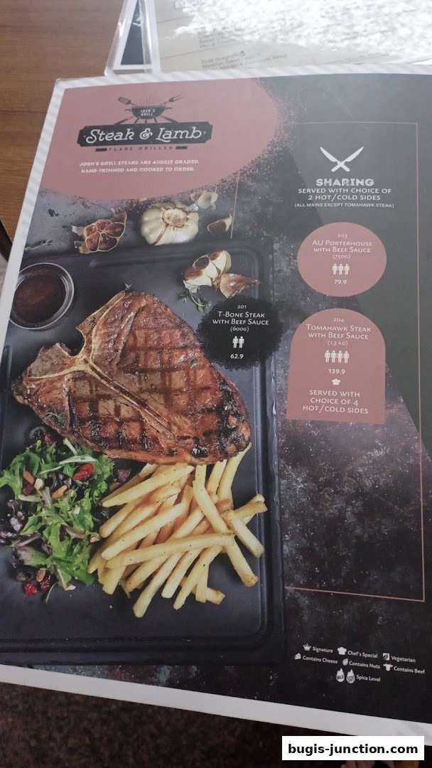 A menu from Josh's Grill featuring steaks, including T-Bone and Tomahawk, with sides.