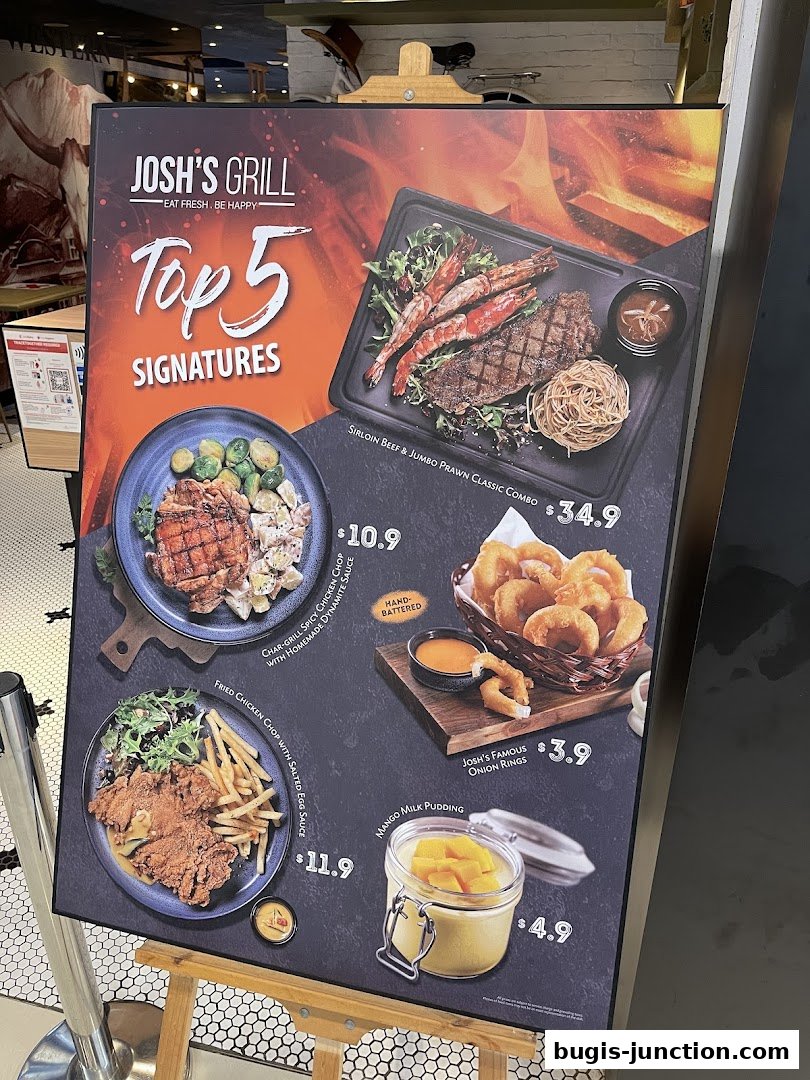 A menu board showcasing Josh's Grill's top 5 signature dishes with enticing food photography.
