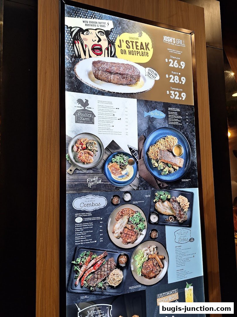 A menu board for Josh's Grill featuring steaks, poultry, seafood, combos, sides, and drinks.