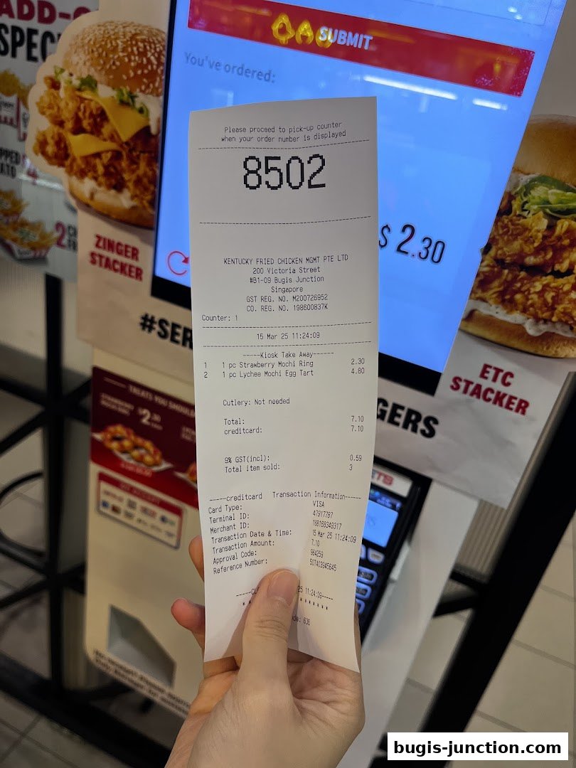 A receipt from KFC with order number 8502 and purchased items.