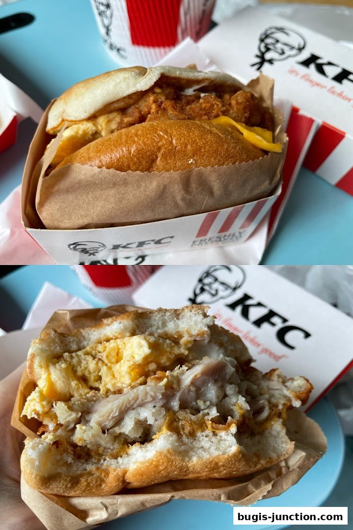 A close-up of a KFC chicken sandwich, showing the crispy chicken and soft bun.