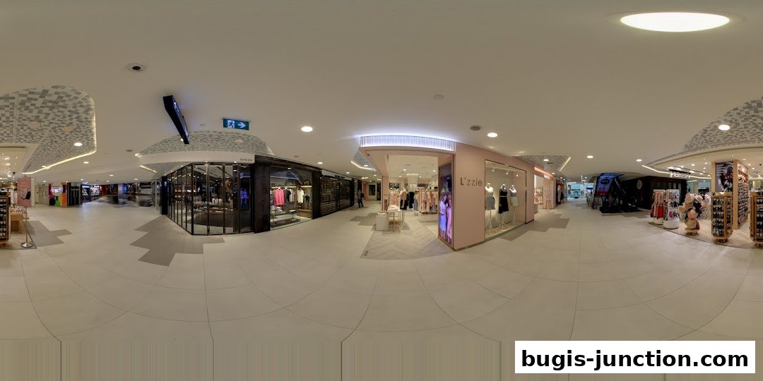 The Lzzie shop front in a modern shopping mall with clothing displays.