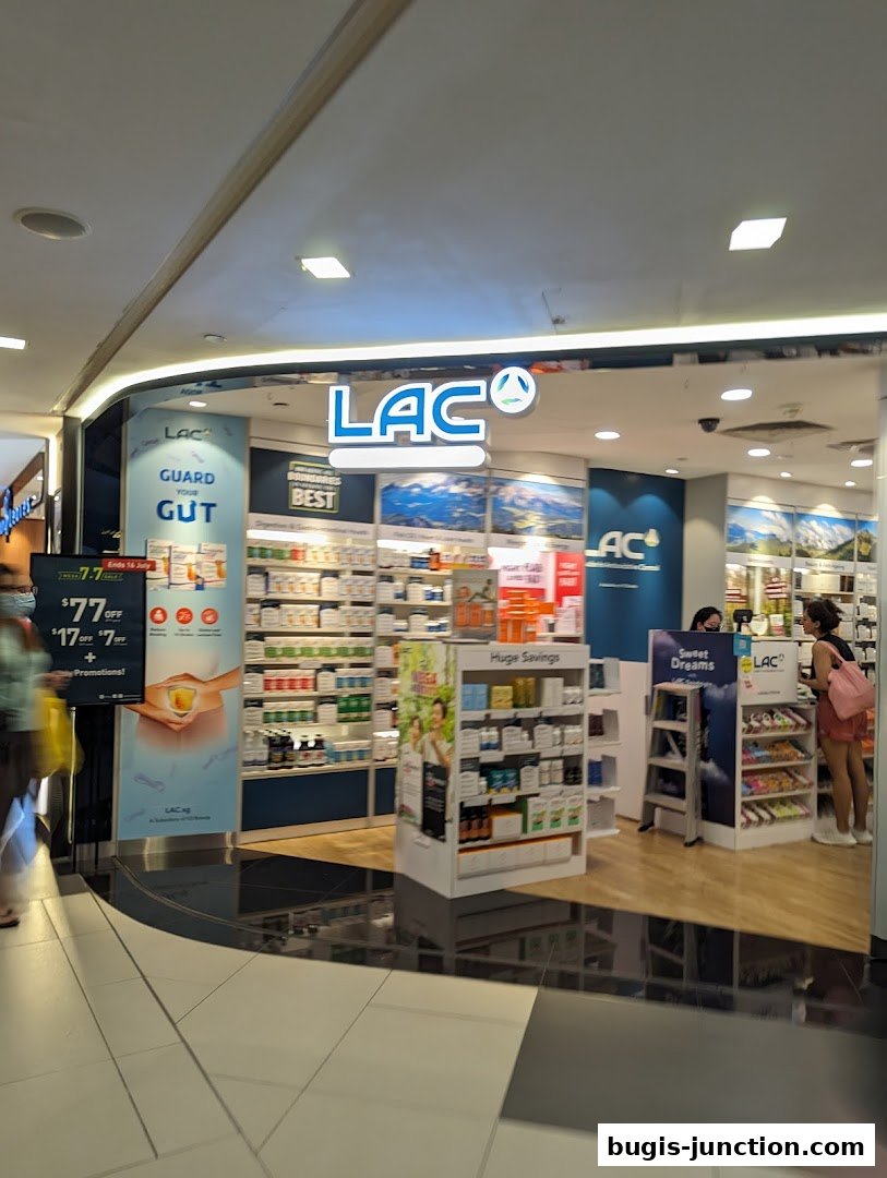 The LAC Nutrition For Life shop front displays health supplements and promotional signage.