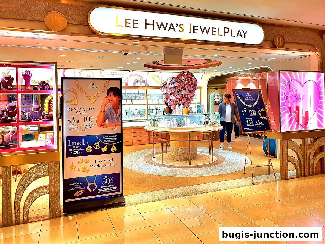 The entrance of Lee Hwa Jewellery shop with displays of jewelry and promotional banners.