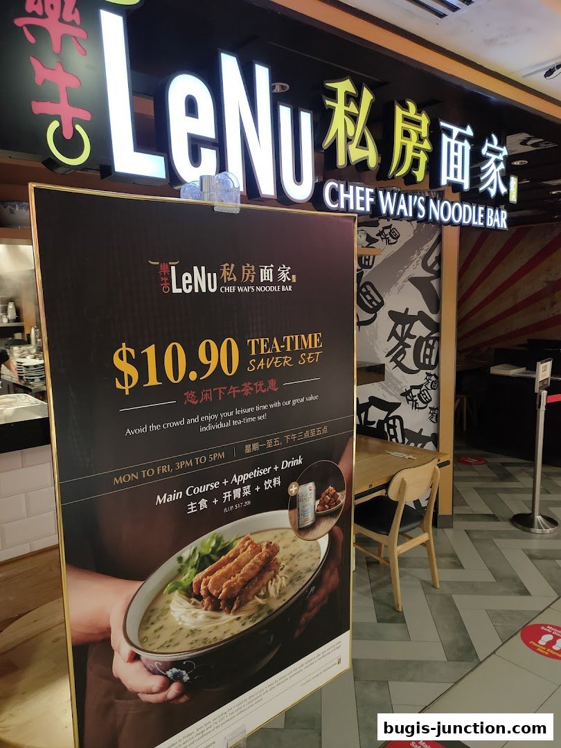 A sign advertises a tea-time saver set at LeNu Chef Wai's Noodle Bar.