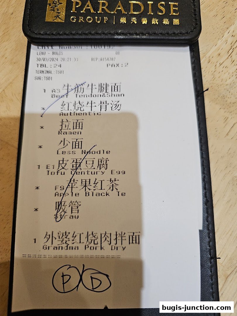 A receipt from LeNu Chef Wais Noodle Bar showing various noodle dishes and drinks.