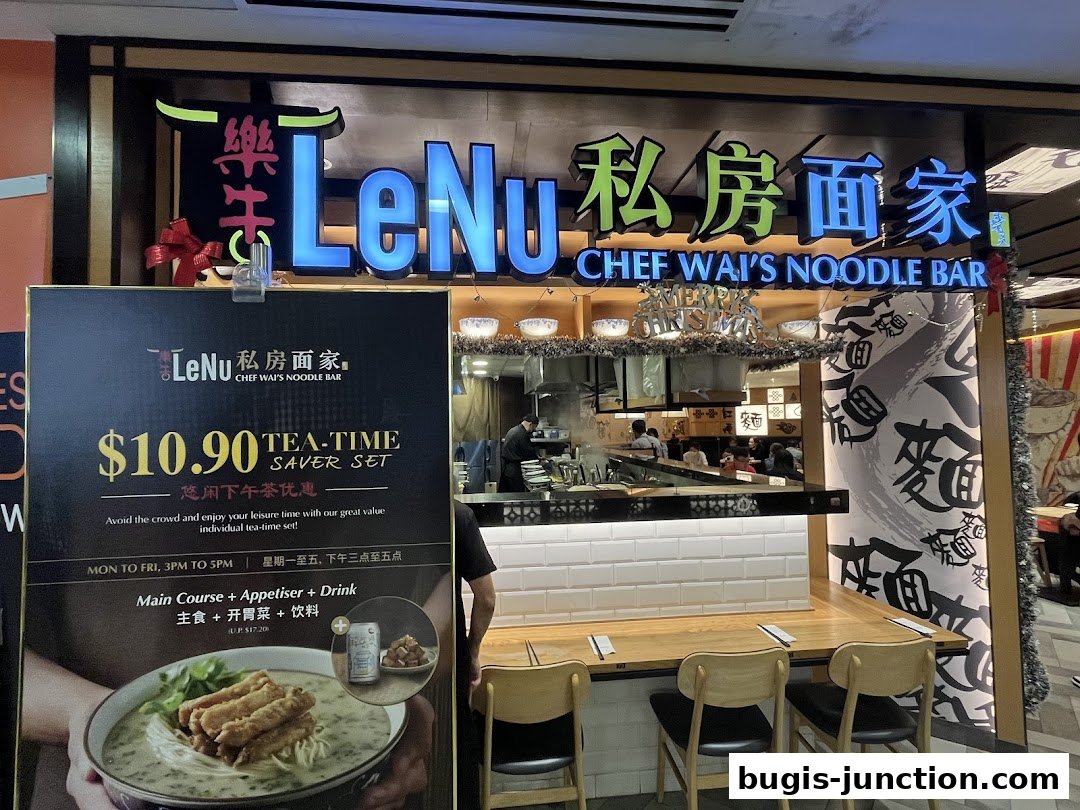 LeNu Chef Wai's Noodle Bar storefront with a promotional sign for a tea-time saver set.