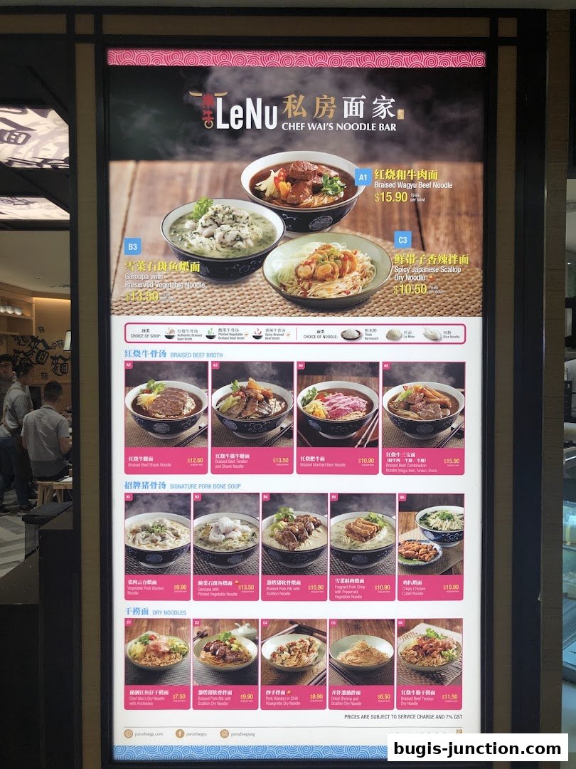A menu board for LeNu Chef Wai's Noodle Bar featuring various noodle dishes and soups.