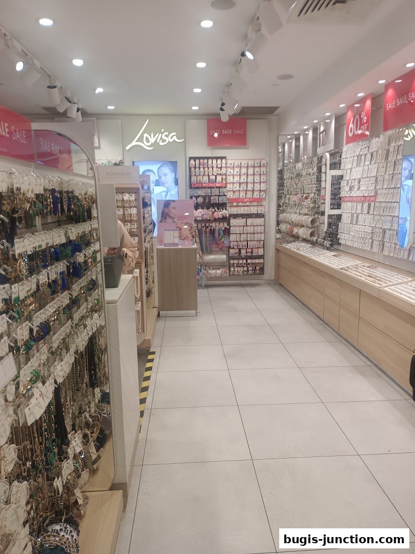 Interior view of a Lovisa jewelry store showcasing a wide selection of earrings, necklaces, and accessories.