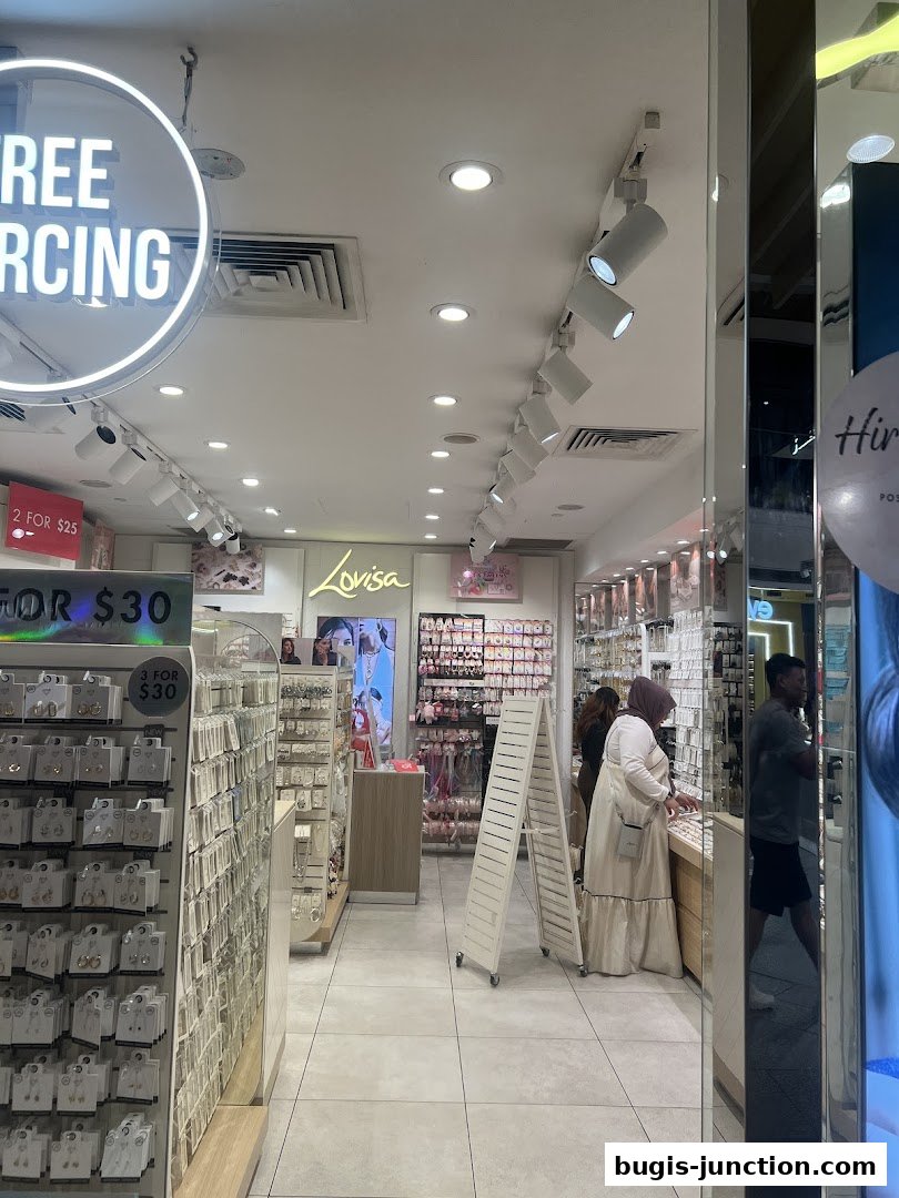 Interior view of a Lovisa store showcasing jewelry and offering free piercing services.