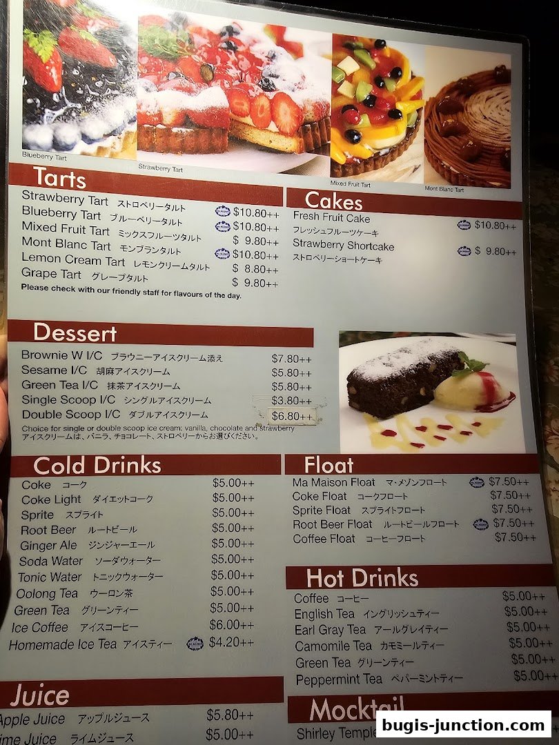 A menu featuring tarts, cakes, desserts, cold drinks, floats, hot drinks, and mocktails.
