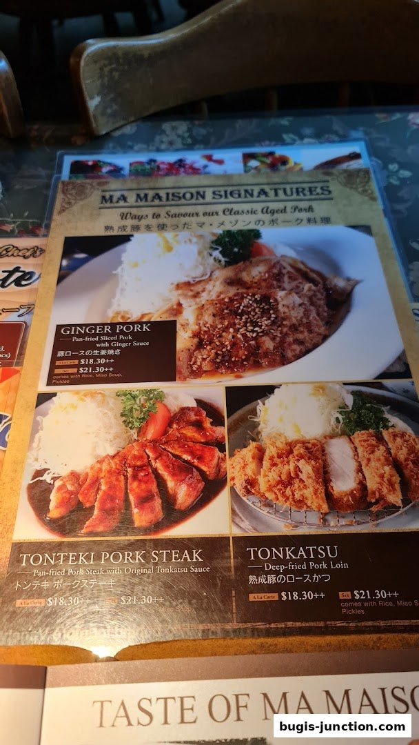 A menu from MA MAISON featuring signature aged pork dishes like Ginger Pork, Tonteki Pork Steak, and Tonkatsu.