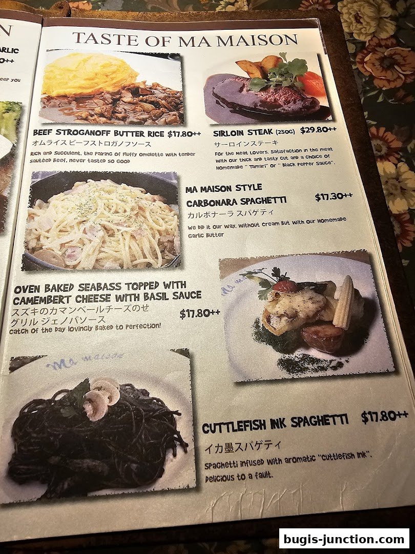A menu page from MA MAISON featuring various pasta and meat dishes with accompanying images.