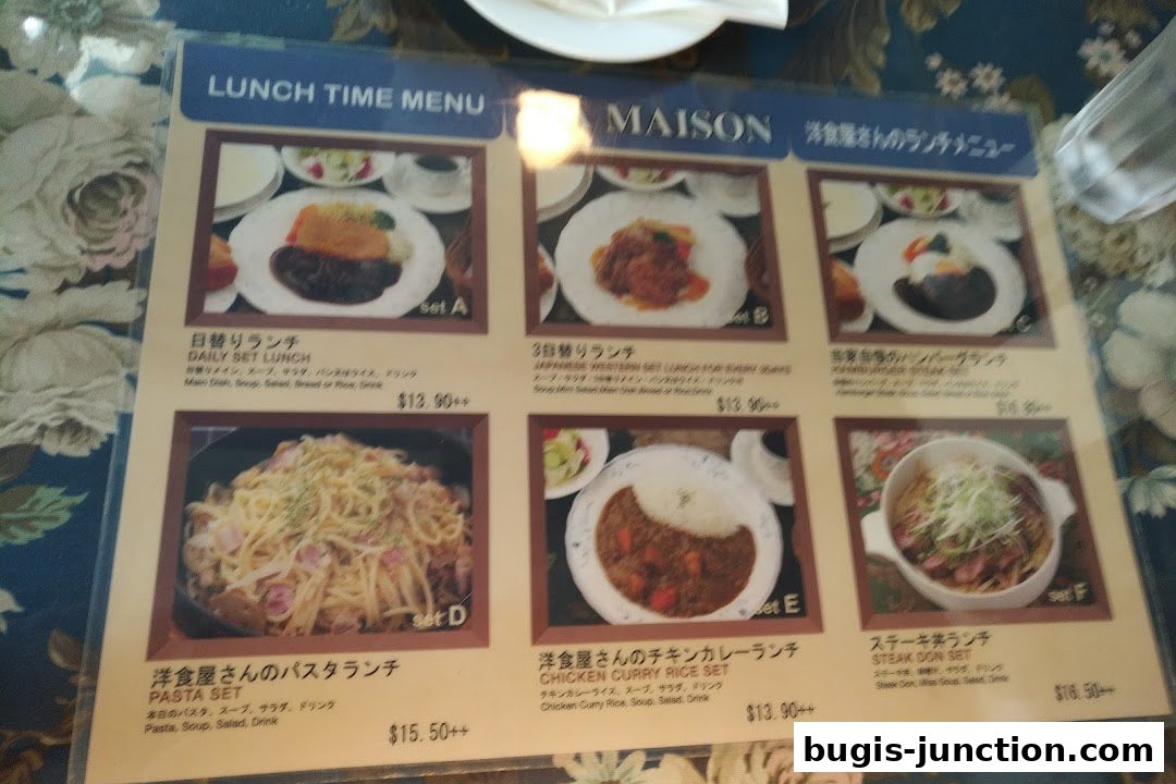 A lunch menu from MA MAISON featuring various set meals with images and descriptions.