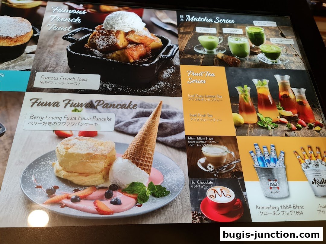 A menu showcasing French toast, pancakes, matcha drinks, fruit teas, coffee, and alcoholic beverages.