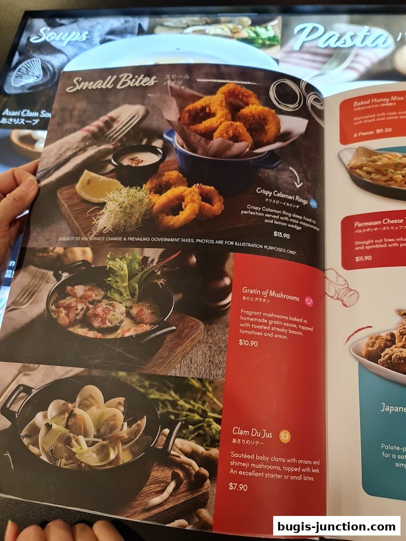 A menu page featuring small bites like calamari rings, gratin of mushrooms, and clam du jus.