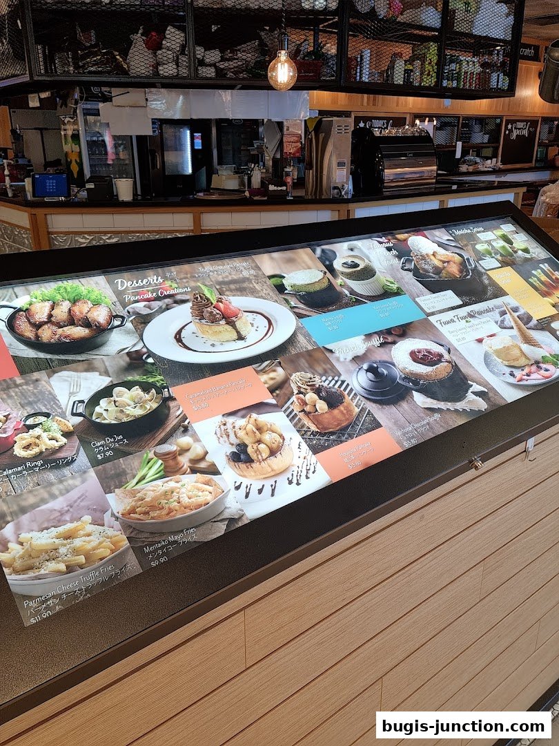 A digital menu displaying various food items with appealing images and prices.