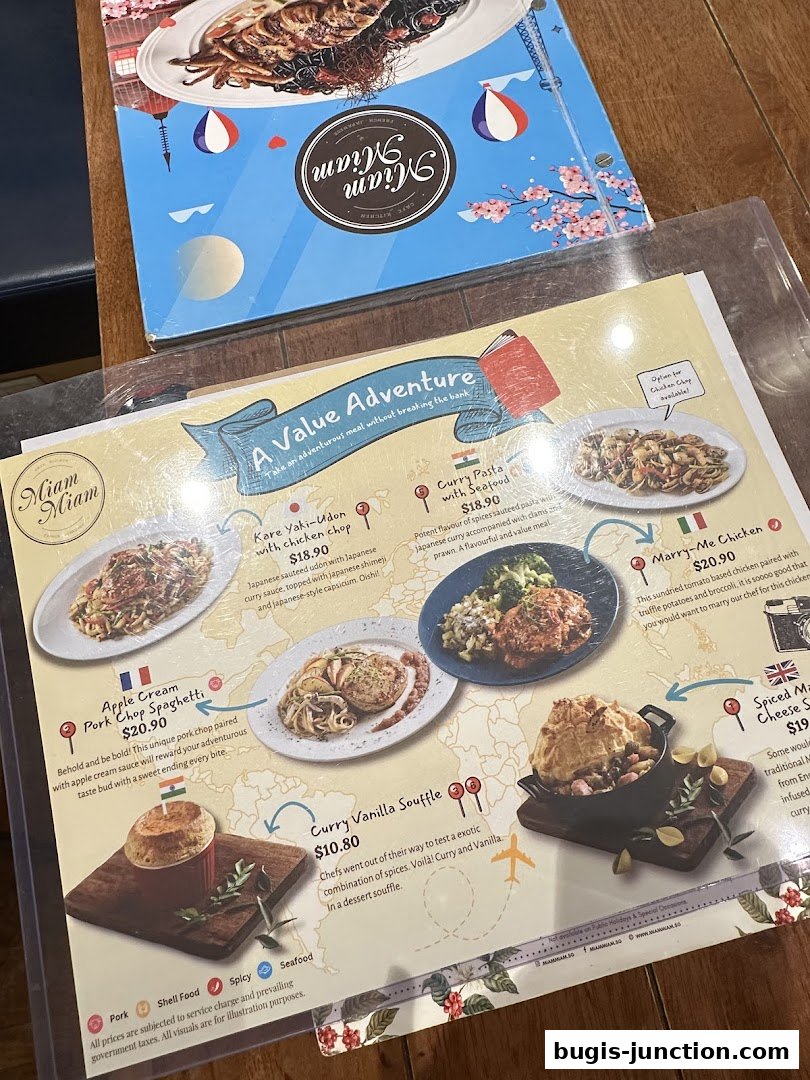 A menu from Miam Miam French Japanese Cafe Kitchen showcasing various dishes.