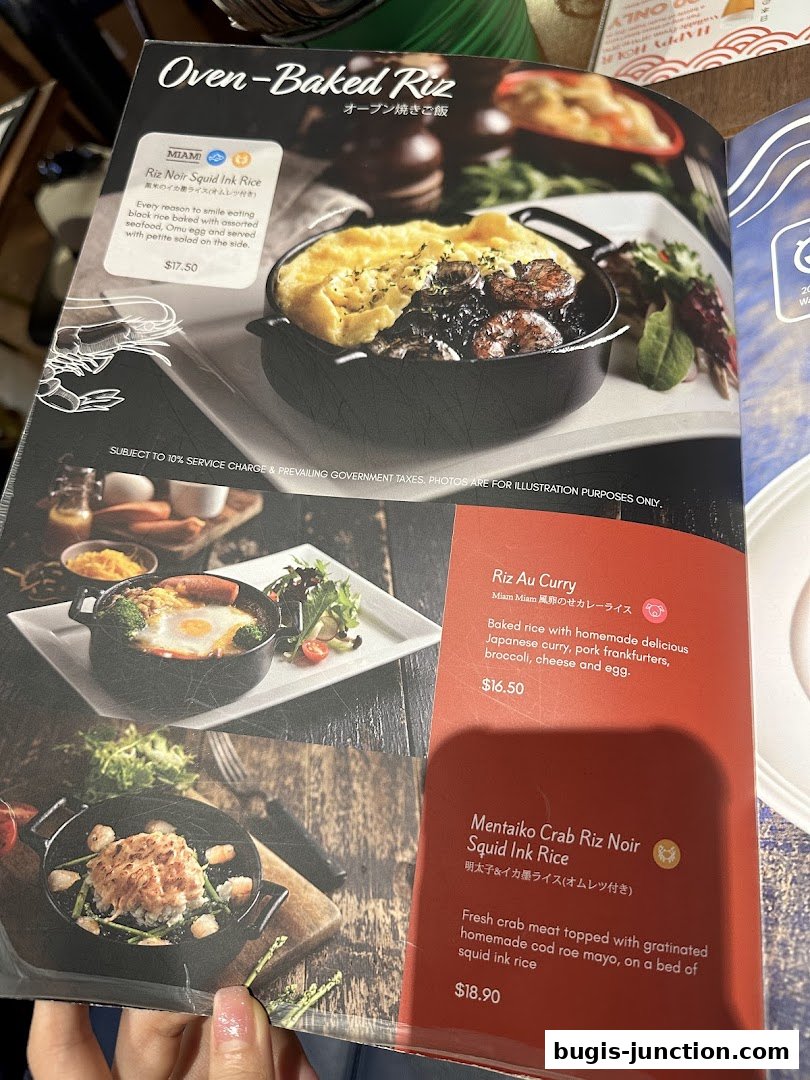 A menu page showcasing oven-baked rice dishes with descriptions and prices.