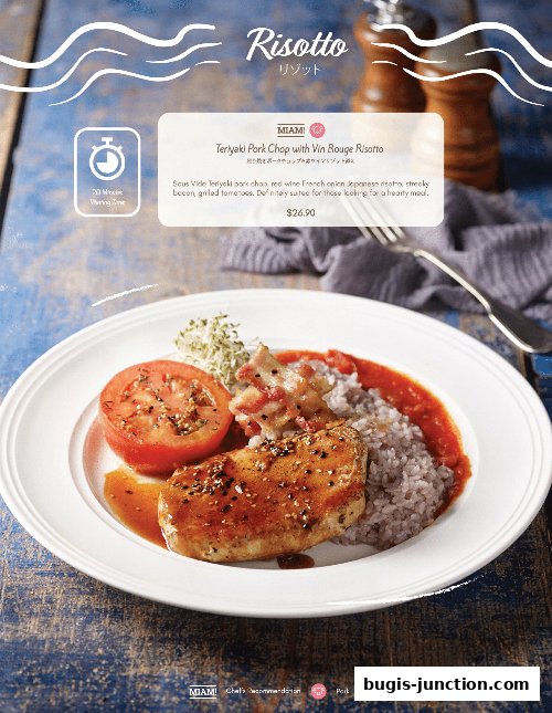 A plate of Teriyaki Pork Chop with Vin Rouge Risotto, a signature dish.
