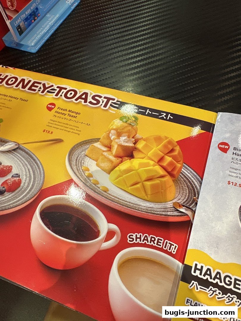 A menu featuring Honey Toast with fresh mango and coffee.