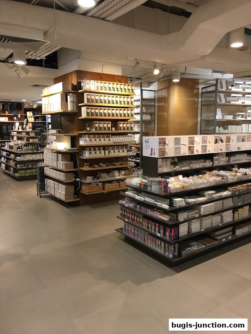 Interior view of a MUJI store showcasing shelves filled with various lifestyle and home goods.