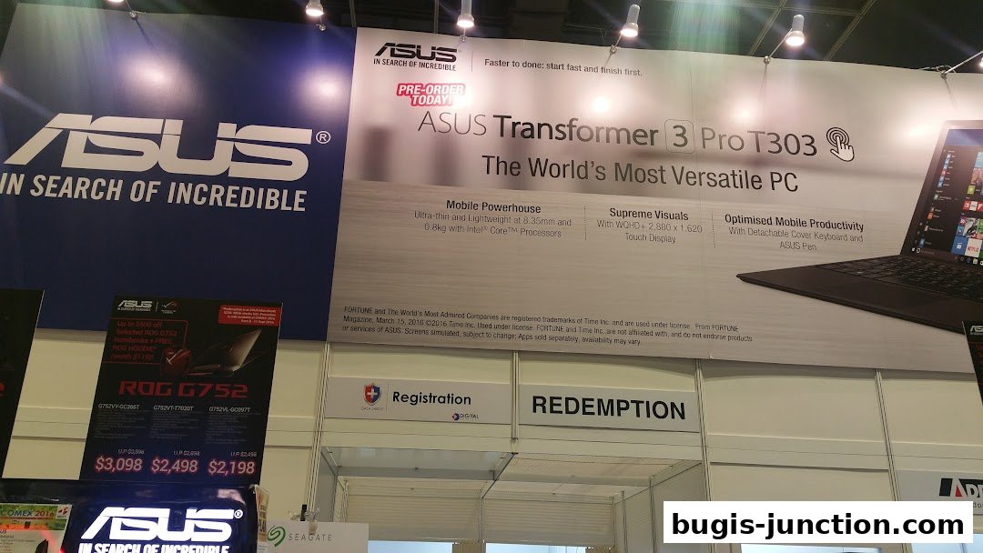 A large banner showcasing ASUS products, including the Transformer 3 Pro and ROG G752 laptops.