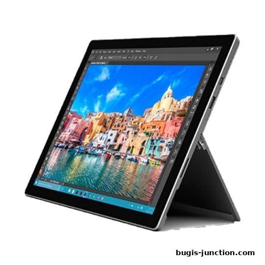 A sleek, modern tablet displaying a vibrant cityscape on its screen.