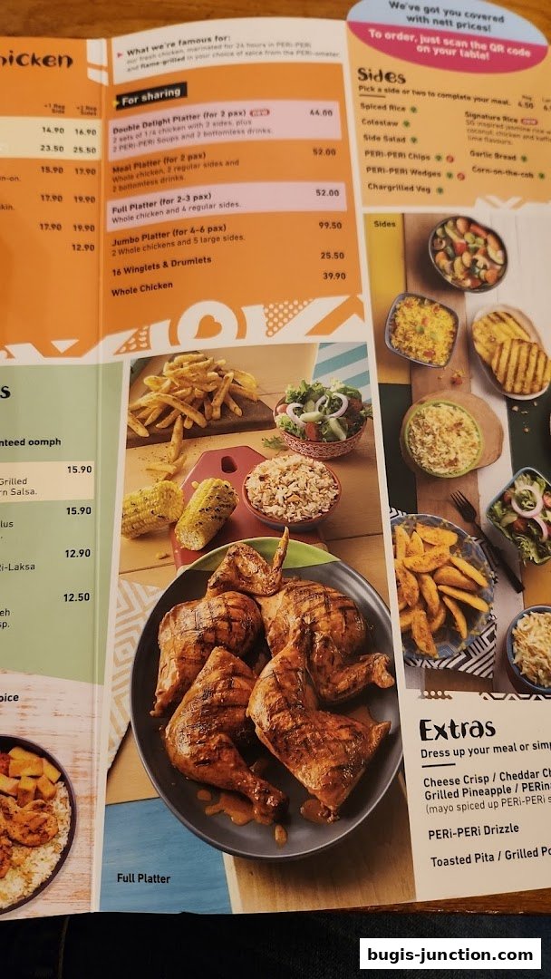 A menu from Nandos featuring flame-grilled PERi-PERi chicken platters and sides.