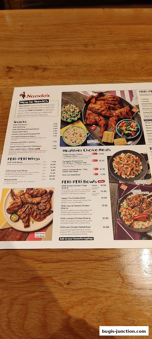A Nando's menu featuring PERi-PERi chicken dishes, wings, and bowls with prices.
