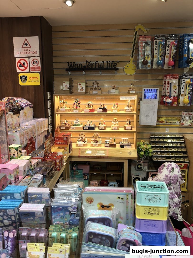 A retail shop interior displaying various stationery, gifts, and collectible items.