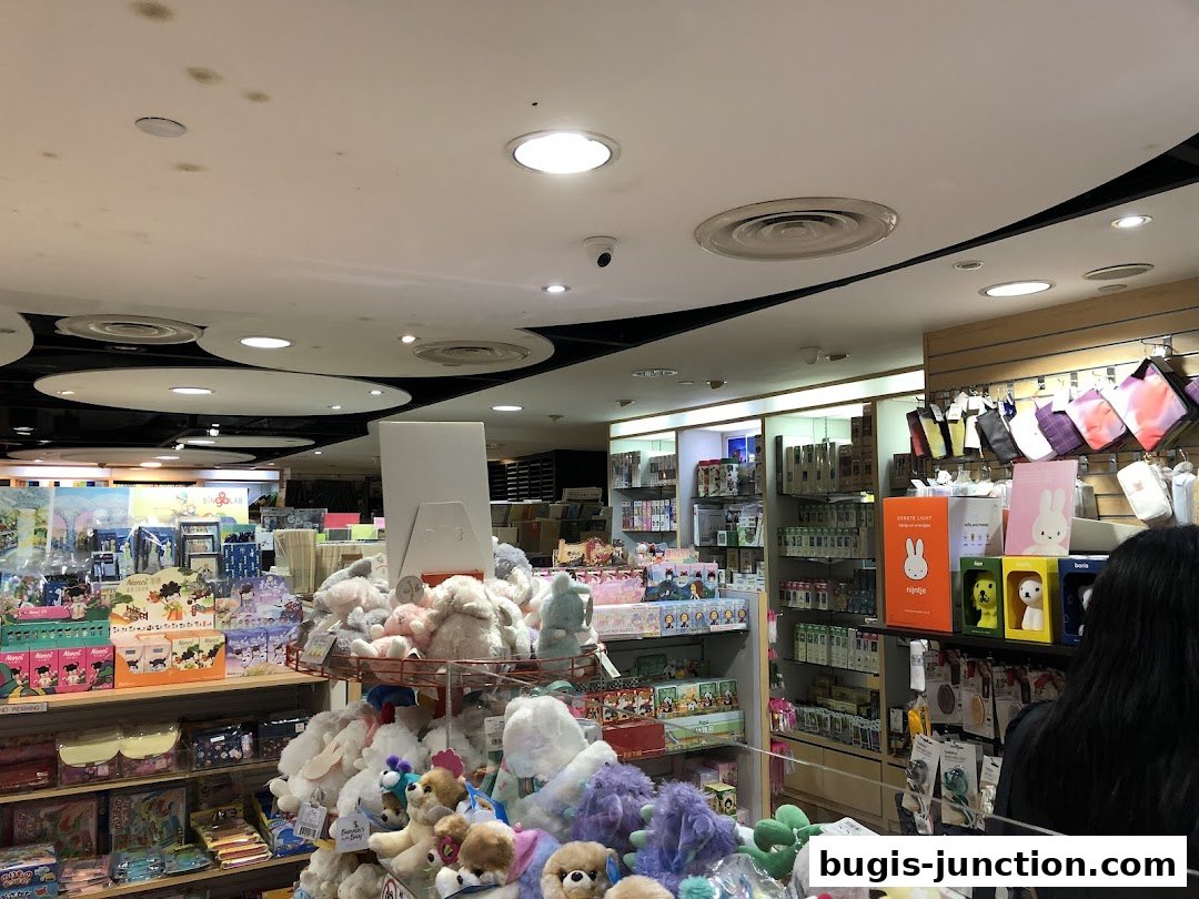 Interior view of a stationery and gift shop filled with plush toys and various merchandise.