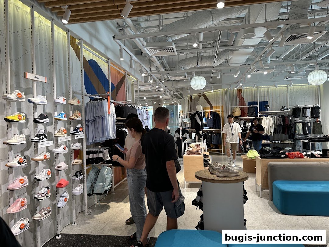 Interior view of a Nike store showcasing a wide selection of sneakers and apparel.