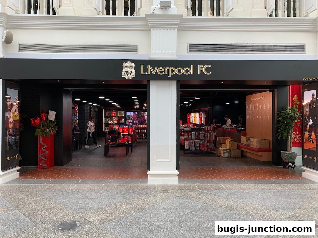 The entrance to the Official Liverpool FC Retail store in Singapore, showcasing merchandise and team spirit.