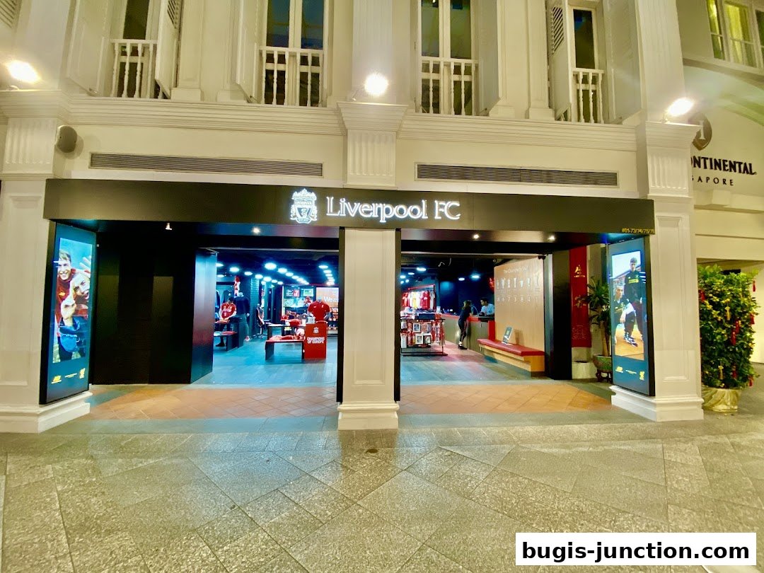 The entrance to the Official Liverpool FC Retail store in Singapore, showcasing merchandise and team spirit.