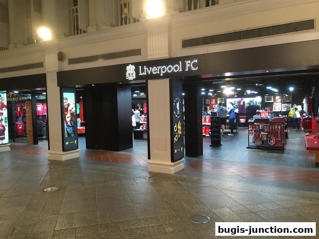 The entrance to the Official Liverpool FC Retail store in Singapore, showcasing merchandise.