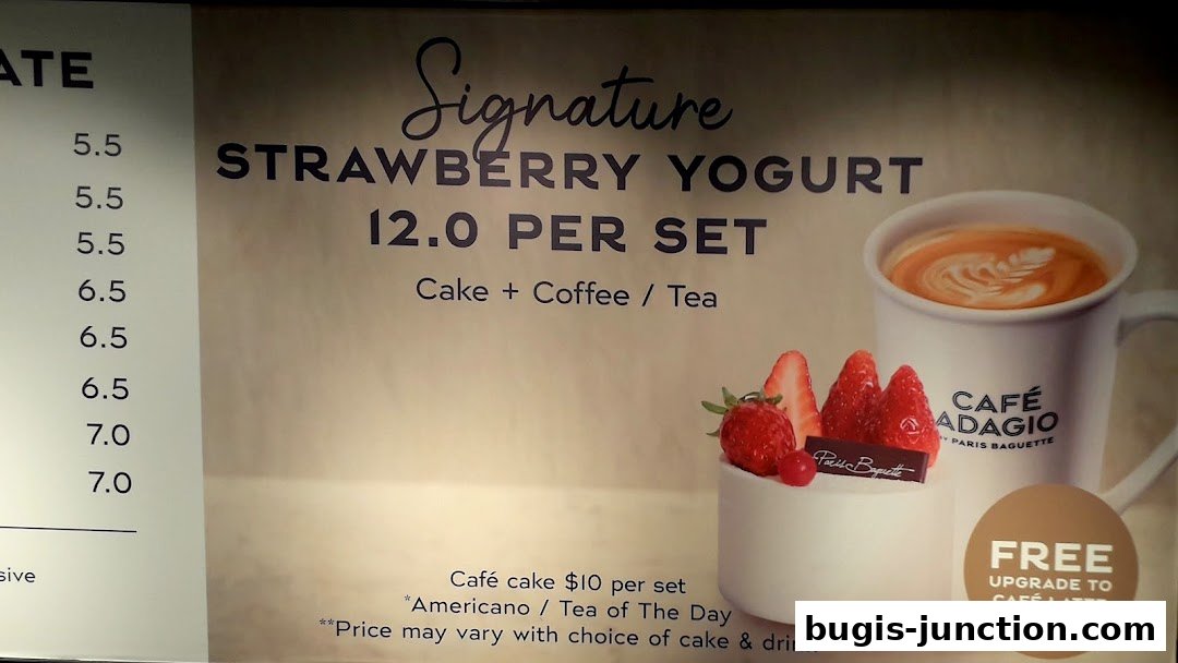 A menu item featuring strawberry yogurt cake with coffee or tea, and a free upgrade offer.