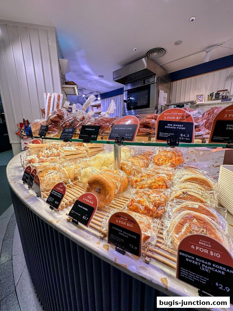 A display of freshly baked breads and pastries at Paris Baguette Bugis Junction.