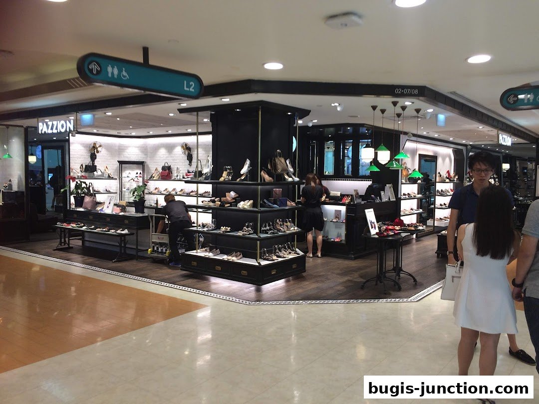 Interior view of a PAZZION shoe store showcasing various footwear and handbags.