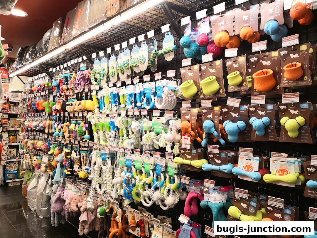 A wide selection of colorful dog toys and accessories displayed on shelves.