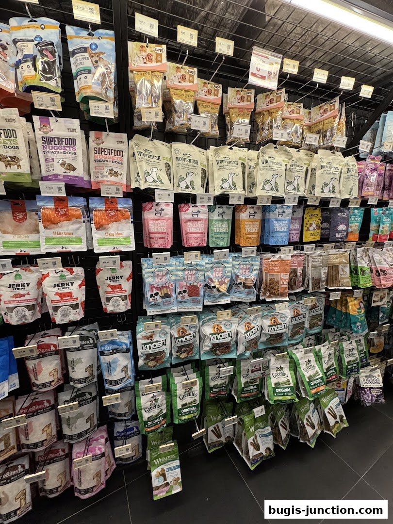 Shelves stocked with various pet treats and food products, neatly organized.