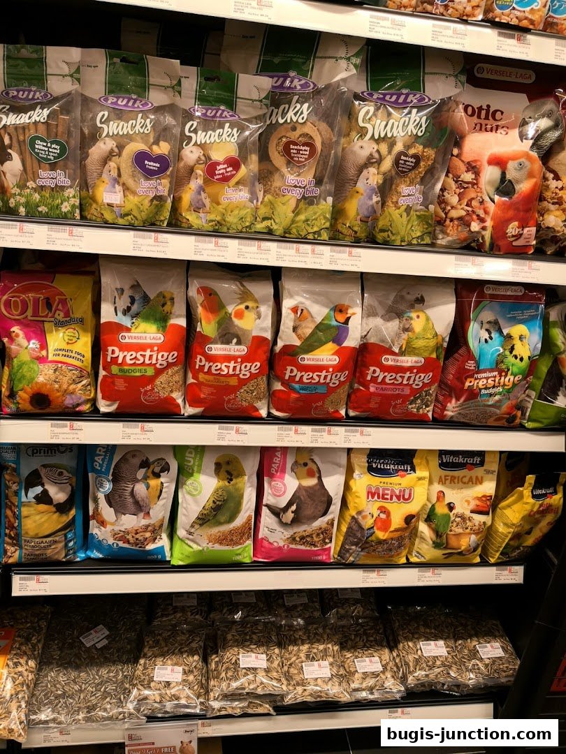 Shelves stocked with various bags of bird food and snacks.