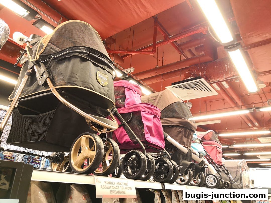 A row of pet strollers in various colors displayed on shelves.
