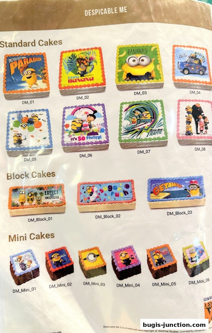 A menu showcasing various Despicable Me themed cakes, including standard, block, and mini sizes.