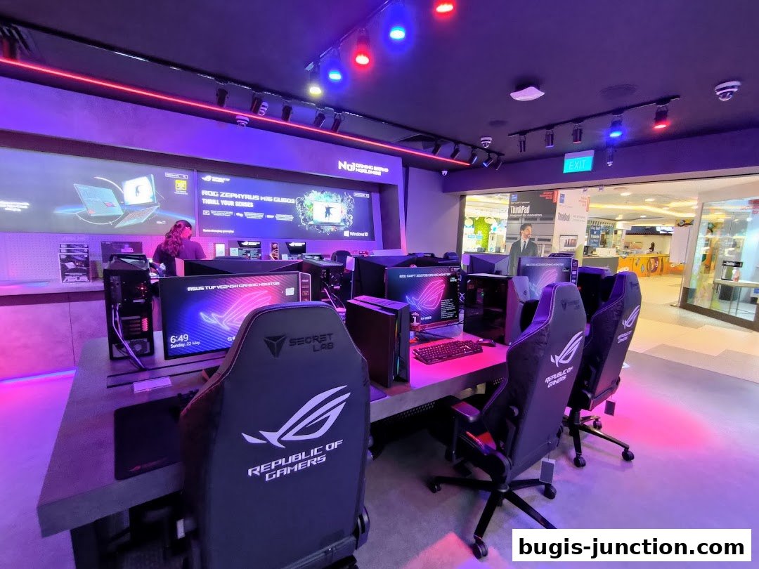 Interior of a ROG Experience Store with gaming setups and chairs.