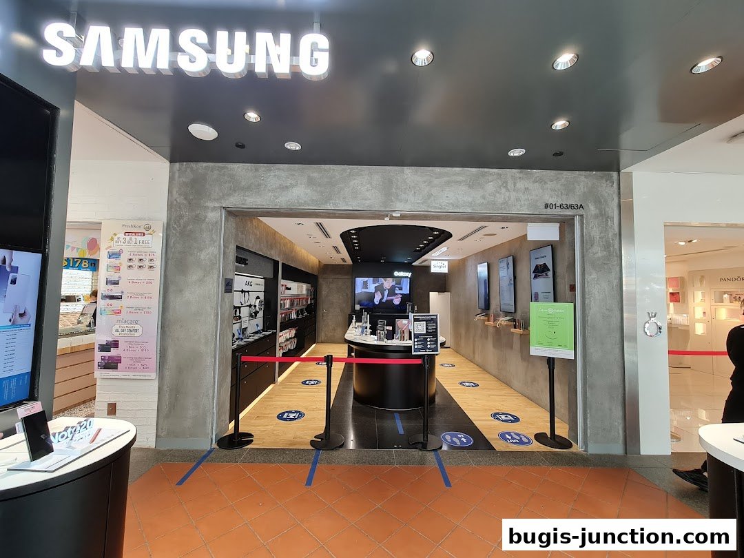 The entrance to a Samsung Experience Store with displays of phones and accessories.