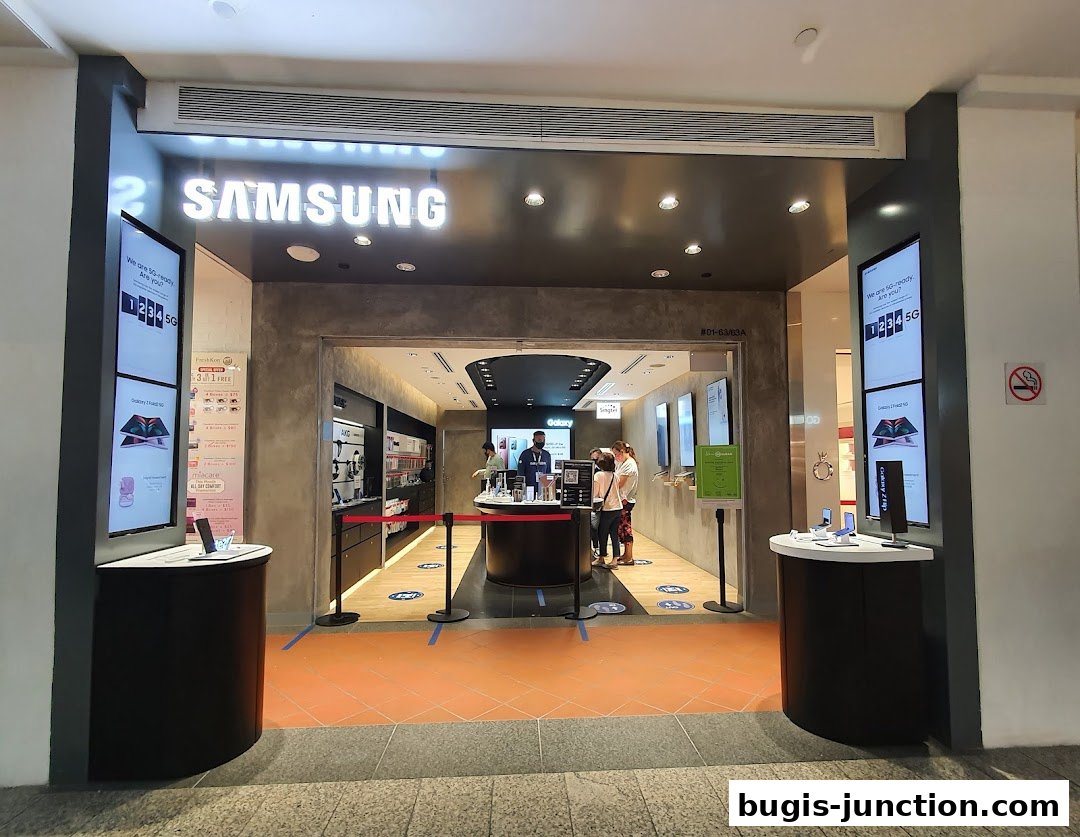 The entrance to a Samsung Experience Store with digital displays and product showcases.