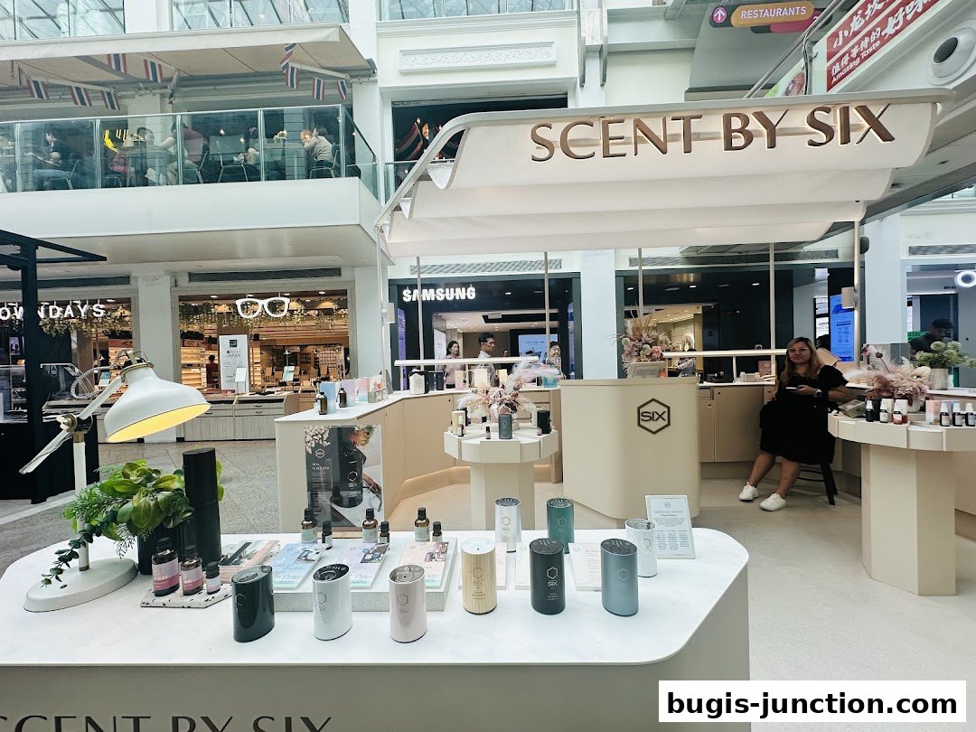 A well-lit retail display featuring various scent products and diffusers from Scent by SIX.